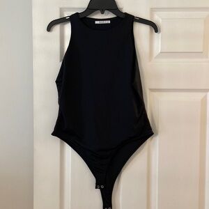 REORIA bodysuit size L color black excellent condition length 27” bust 15”